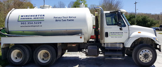 Septic pumping truck equipped with a 100 foot hose to easily reach almost any septic tank.